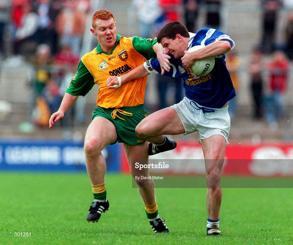 22 June 1997; Larry Reilly of Cavan in action against Peter McGinley of Donegal during the Ulster GAA Football Senior Championship Semi-Final match between Cavan and Donegal at St. Tiernach's Park in Clones, Monaghan. Photo by David Maher/Sportsfile