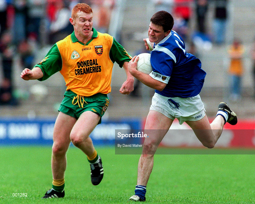 22 June 1997; Larry Reilly of Cavan in action against Peter McGinley of Donegal during the Ulster GAA Football Senior Championship Semi-Final match between Cavan and Donegal at St. Tiernach's Park in Clones, Monaghan. Photo by David Maher/Sportsfile