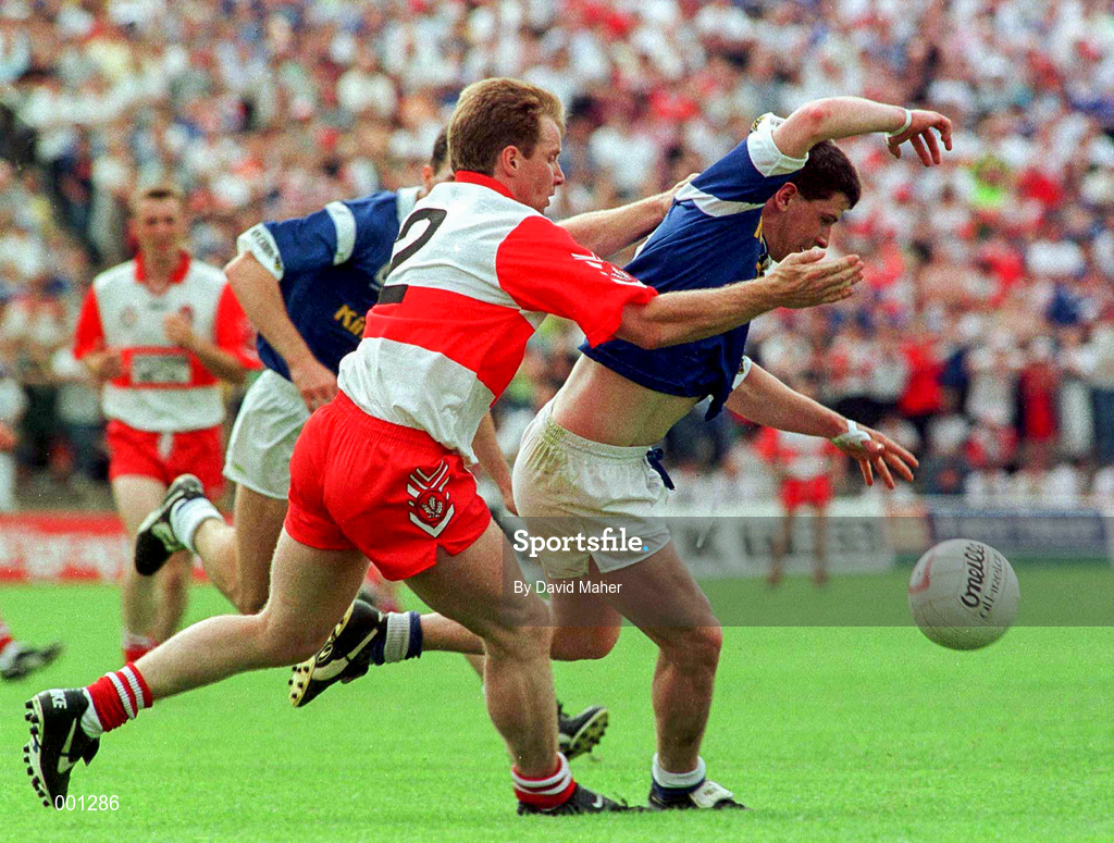 20 July 1997; Larry Reilly of Cavan in action against Kieren McKeever of Derry during the Ulster GAA Football Senior Championship Final match between Cavan and Derry at St. Tiernach's Park in Clones, Monaghan. Photo by David Maher/Sportsfile