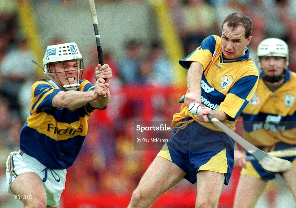 6 July 1997; Liam Doyle of Clare in action against Philip O'Dwyer of Tipperary during the GAA Munster Senior Hurling Championship Final match between Clare and Tipperary at Páirc Uí Chaoimh in Cork. Photo by Ray McManus/Sportsfile