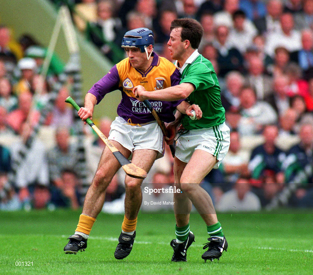 1 September 1996; Liam Dunne of Wexford holds in action against Gary Kirby of Limerick during the GAA All-Ireland Senior Hurling Championship Final match between Wexford and Limerick at Croke Park in Dublin. Photo by David Maher/Sportsfile