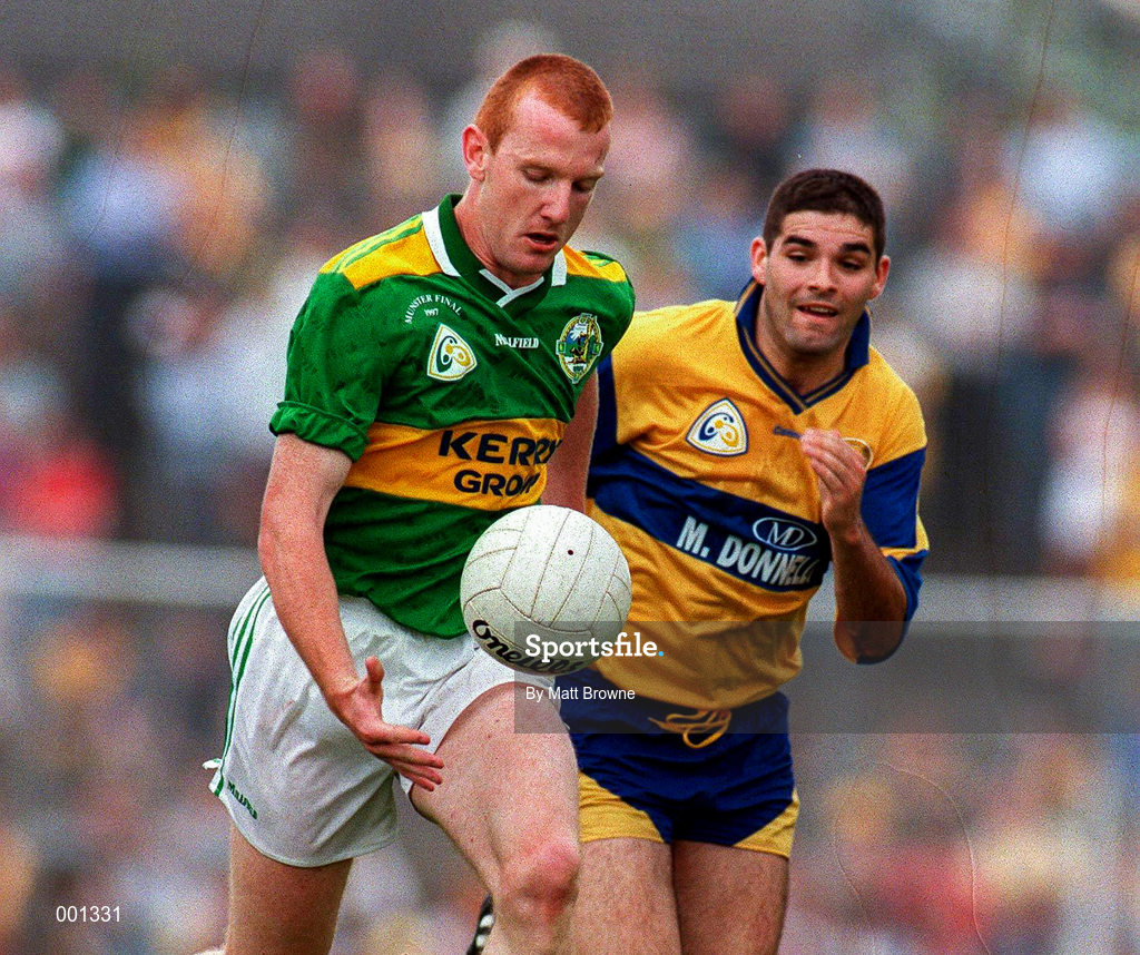 20 July 1997; Liam Hasett of Kerry in action against Cathal Shannon of Clare during the GAA Munster Senior Football Championship Final match between Kerry and Clare at Gaelic Grounds in Limerick. Photo by Matt Browne/Sportsfile