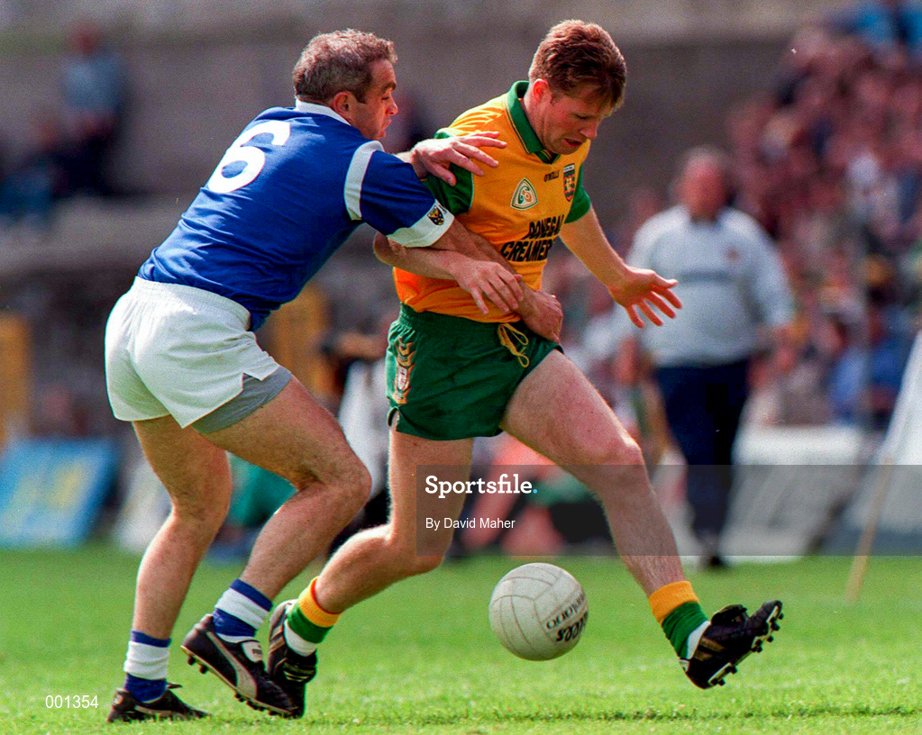 22 June 1997; Manus Boyle of Donegal in action against Bernard Morris of Cavan during the Ulster GAA Football Senior Championship Semi-Final match between Cavan and Donegal at St. Tiernach's Park in Clones, Monaghan. Photo by David Maher/Sportsfile