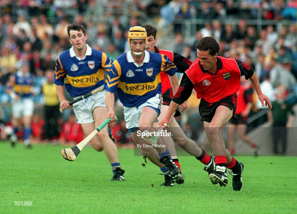 26 July 1997; Martin Coulter Sr of Down in action against Liam Cahill of Tipperary during the GAA All-Ireland Senior Hurling Championship Quarter-Final match between Tipperary and Down at St. Tiernach's Park in Clones, Monaghan. Photo by David Maher/Sportsfile