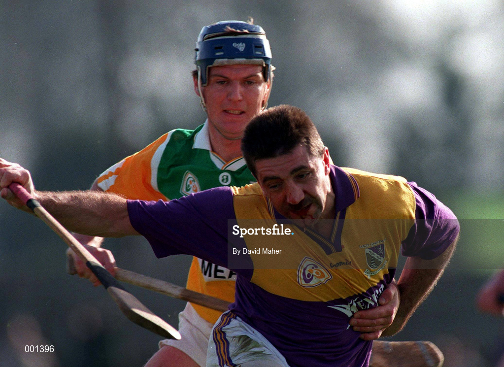 23 March 1997; Martin Storey of Wexford in action against Hubert Rigney of Offaly during the National Hurling League Division 1 match between Offaly and Wexford at St. Brendan's Park in Birr, Offaly. Photo by David Maher/Sportsfile