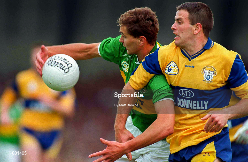 20 July 1997; Maurice Fitzgerald of Kerry in action against Padraig Gallagher of Clare during the GAA Munster Senior Football Championship Final match between Kerry and Clare at Gaelic Grounds in Limerick. Photo by Matt Browne/Sportsfile