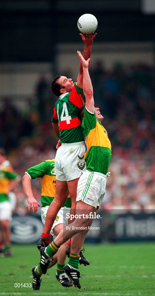 28 September 1997; Liam Mchale of Mayo in action against Dara Ó Sé of Kerry during the GAA Football All-Ireland Senior Championship Final match between Kerry and Mayo at Croke Park in Dublin. Photo by Brendan Moran/Sportsfile