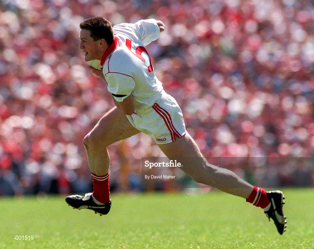 29 June 1997; Noel Donnelly of Tyrone celebrates are scoring the opening goal during the Ulster GAA Football Senior Championship Semi-Final match between Tyrone and Derry at St. Tiernach's Park in Clones, Monaghan. Photo by David Maher/Sportsfile