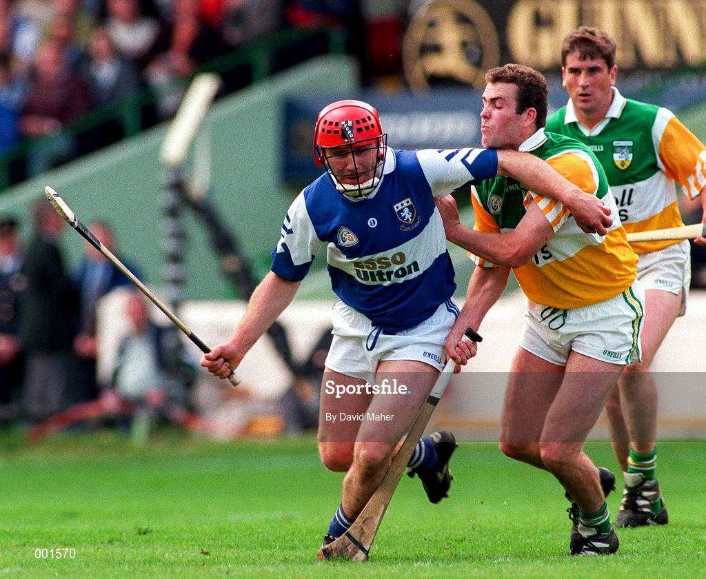 8 June 1997; Owen Coss of Laois in action against Kevin Martin of Offaly during the GAA Leinster Senior Hurling Championship Quarter-Final match between Offaly and Laois at Croke Park in Dublin. Photo by David Maher/Sportsfile