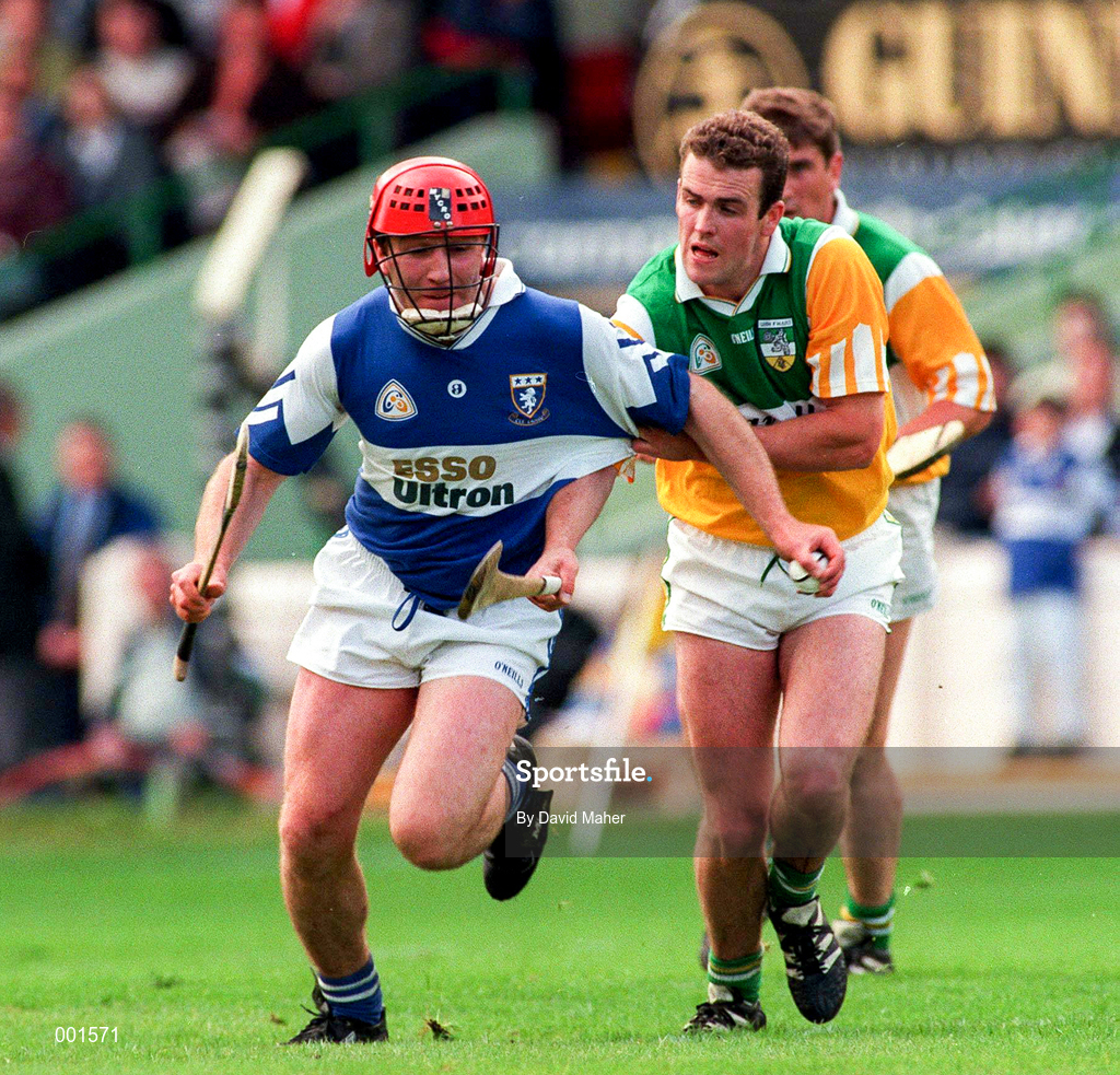8 June 1997; Owen Coss of Laois in action against Kevin Martin of Offaly during the GAA Leinster Senior Hurling Championship Quarter-Final match between Offaly and Laois at Croke Park in Dublin. Photo by David Maher/Sportsfile