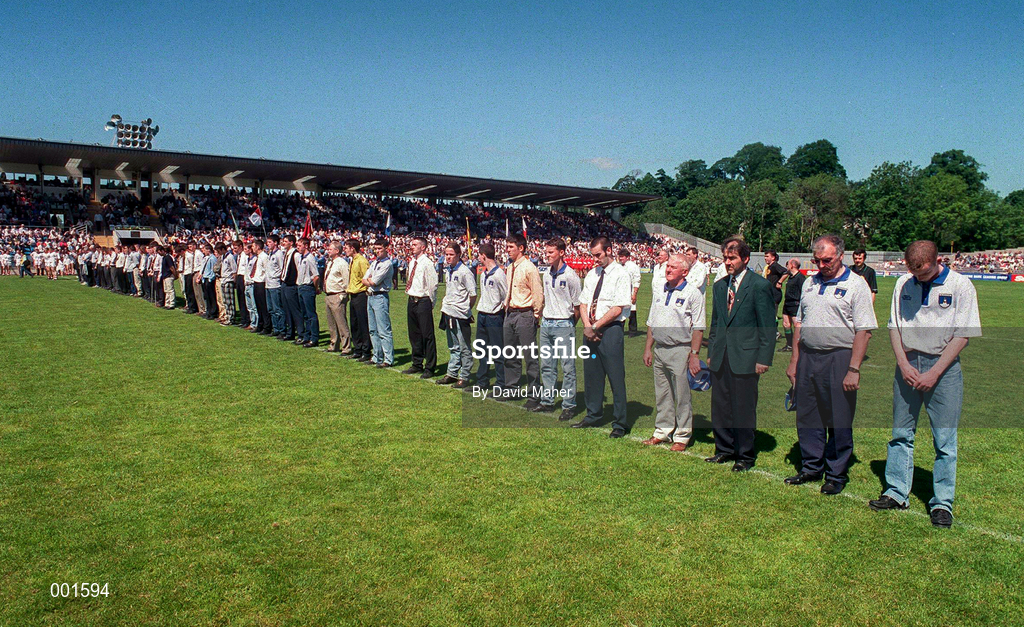 29 June 1997; Players from the Tyrone and Monaghan minoir teams stand for a minutes silence for the late Paul McGirr prior to the Ulster GAA Football Senior Championship Semi-Final match between Tyrone and Derry at St. Tiernach's Park in Clones, Monaghan. Photo by David Maher/Sportsfile