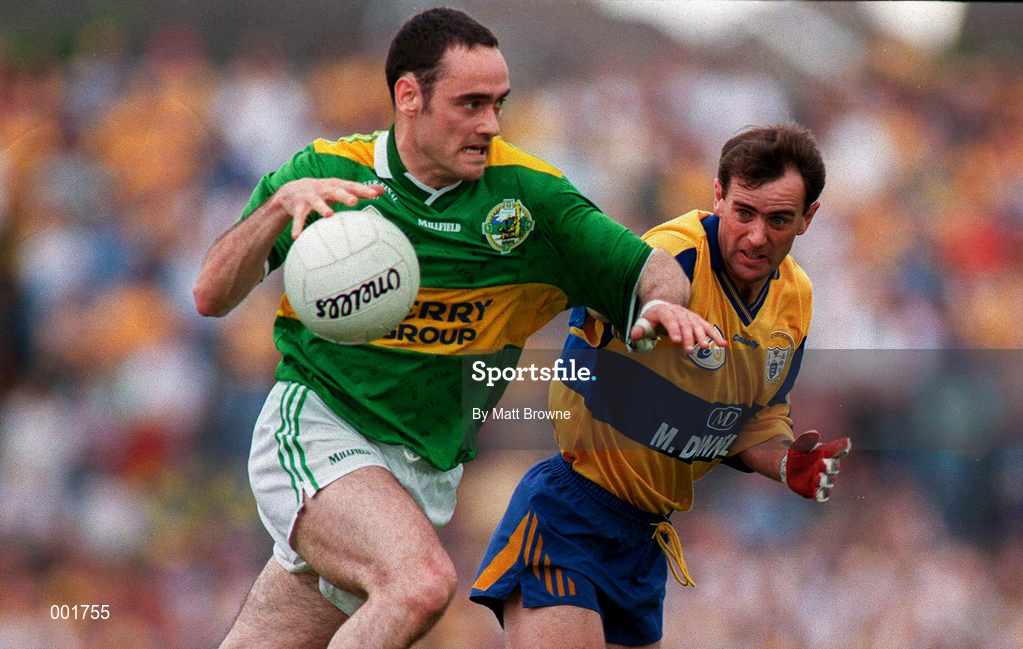20 July 1997; Pa Laide of Kerry in action against John Enright of Clare during the GAA Munster Senior Football Championship Final match between Kerry and Clare at Gaelic Grounds in Limerick. Photo by Matt Browne/Sportsfile