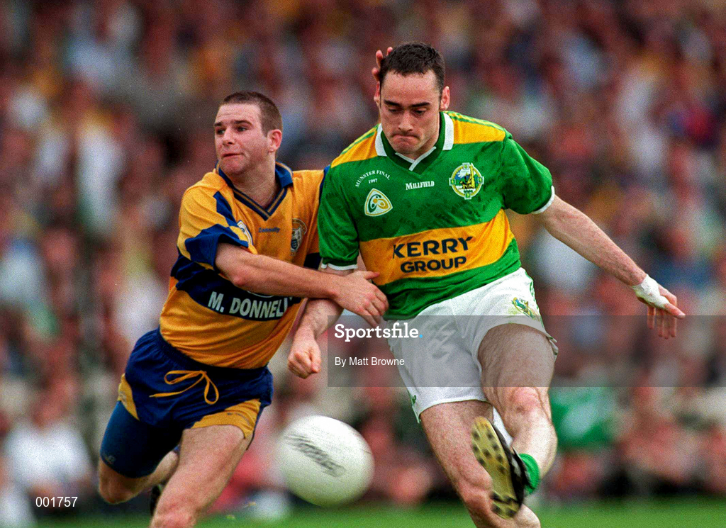 20 July 1997; Pa Laide of Kerry scores his side's goal despite the challenge of Barry Keating of Clare during the GAA Munster Senior Football Championship Final match between Kerry and Clare at Gaelic Grounds in Limerick. Photo by Matt Browne/Sportsfile