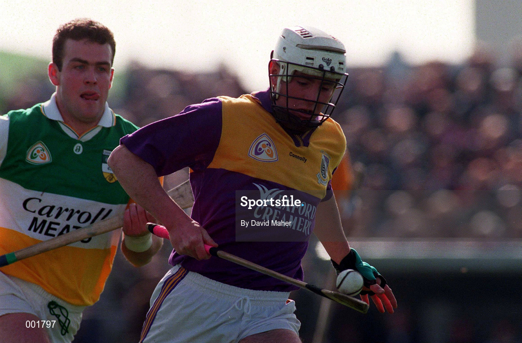 23 March 1997; Paul Codd of Wexford in action against Kevin Martin of Offaly during the National Hurling League Division 1 match between Offaly and Wexford at St. Brendan's Park in Birr, Offaly. Photo by David Maher/Sportsfile