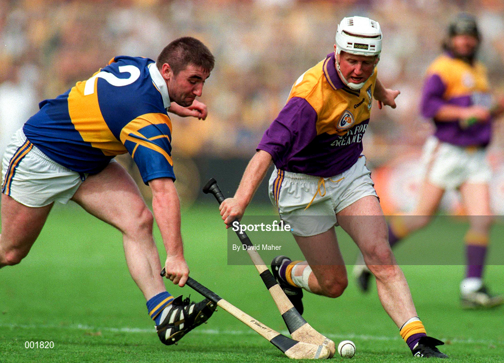 17 August 1997; Tom Dempsey of Wexford in action against Paul Shelly Tipperary during the GAA All-Ireland Senior Hurling Championship Semi-Final match between Tipperary and Wexford at Croke Park in Dublin. Photo by David Maher/Sportsfile