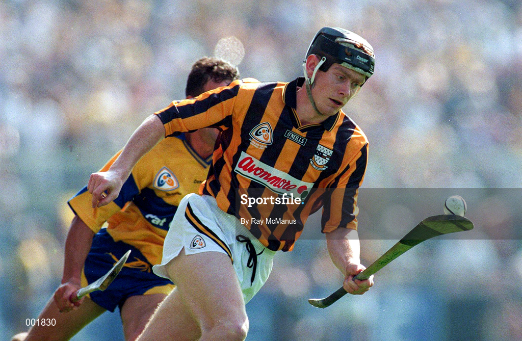 10 August 1997; Peter Barry of Kilkenny in action against P.J. O'Connell of Clare during the GAA All-Ireland Senior Hurling Championship Semi-Final match between Clare and Kilkenny at Croke Park in Dublin. Photo by Ray McManus/Sportsfile