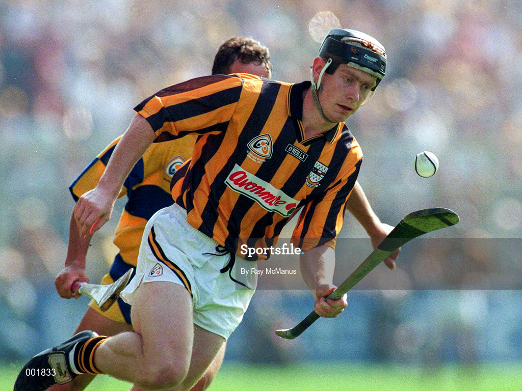 10 August 1997; Peter Barry of Kilkenny in action against P.J. O'Connell of Clare during the GAA All-Ireland Senior Hurling Championship Semi-Final match between Clare and Kilkenny at Croke Park in Dublin. Photo by Ray McManus/Sportsfile