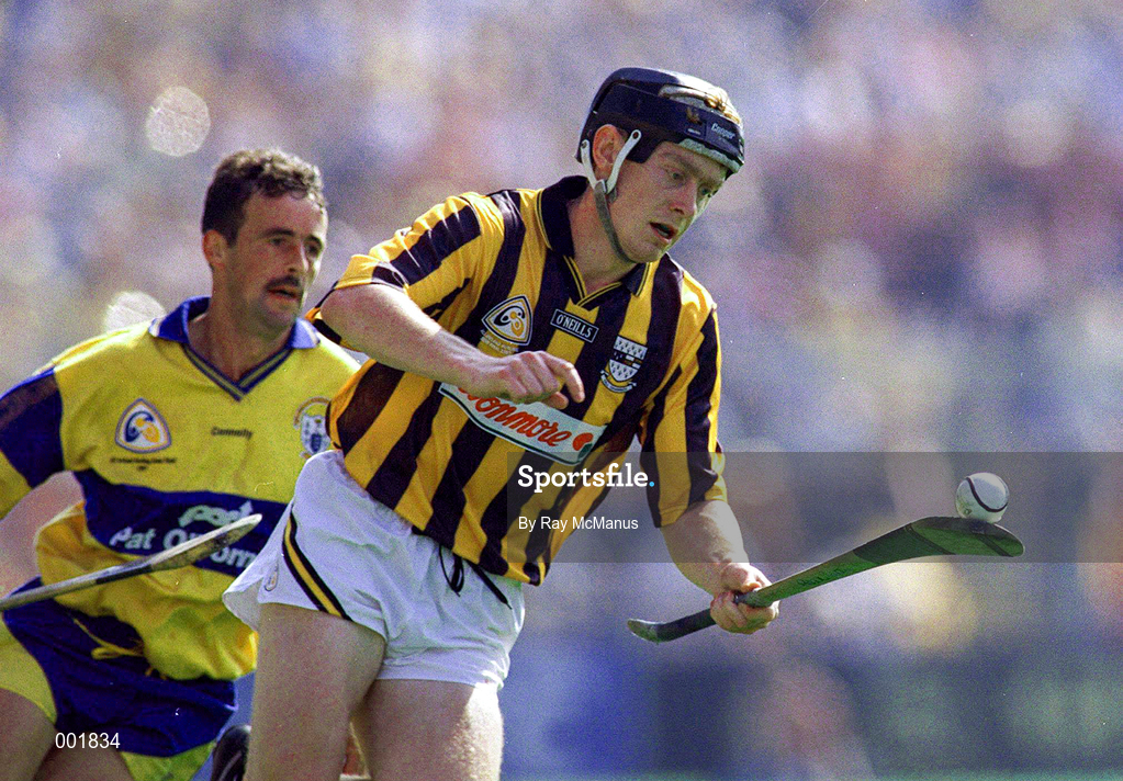 10 August 1997; Peter Barry of Kilkenny in action against P.J. O'Connell of Clare during the GAA All-Ireland Senior Hurling Championship Semi-Final match between Clare and Kilkenny at Croke Park in Dublin. Photo by Ray McManus/Sportsfile