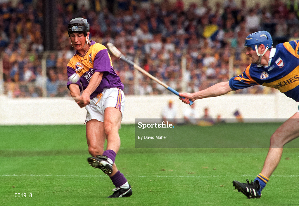 17 August 1997; Rory McCarthy of Wexford  in action against Conal Bonner of Tipperary during the GAA All-Ireland Senior Hurling Championship Semi-Final match between Tipperary and Wexford at Croke Park in Dublin. Photo by David Maher/Sportsfile