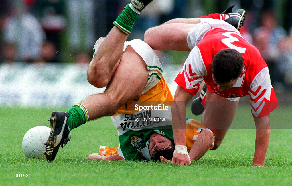 29 June 1997; Roy Malone of Offaly is tackled by Gareth O'Neill of Louth during the Leinster GAA Senior Football Championship Semi-Final match between Offaly and Louth at Páirc Tailteann in Navan, Meath. Photo by Ray McManus/Sportsfile