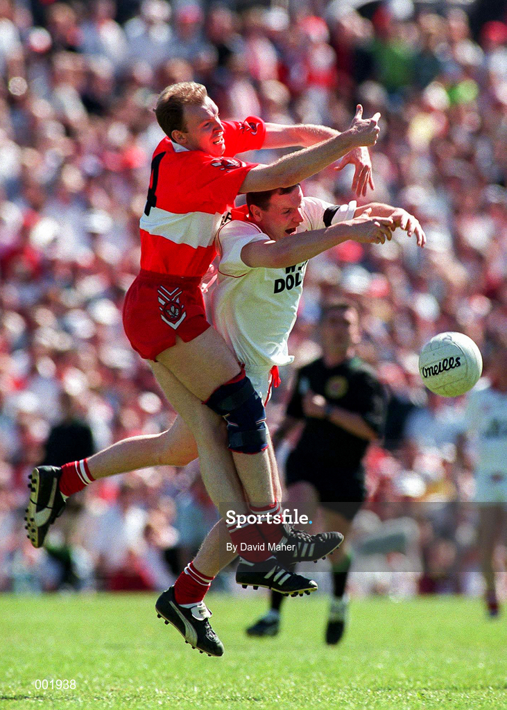 29 June 1997; Seamus Downey of Derry in action against Chris Lawn of Tyrone during the Ulster GAA Football Senior Championship Semi-Final match between Tyrone and Derry at St. Tiernach's Park in Clones, Monaghan. Photo by David Maher/Sportsfile