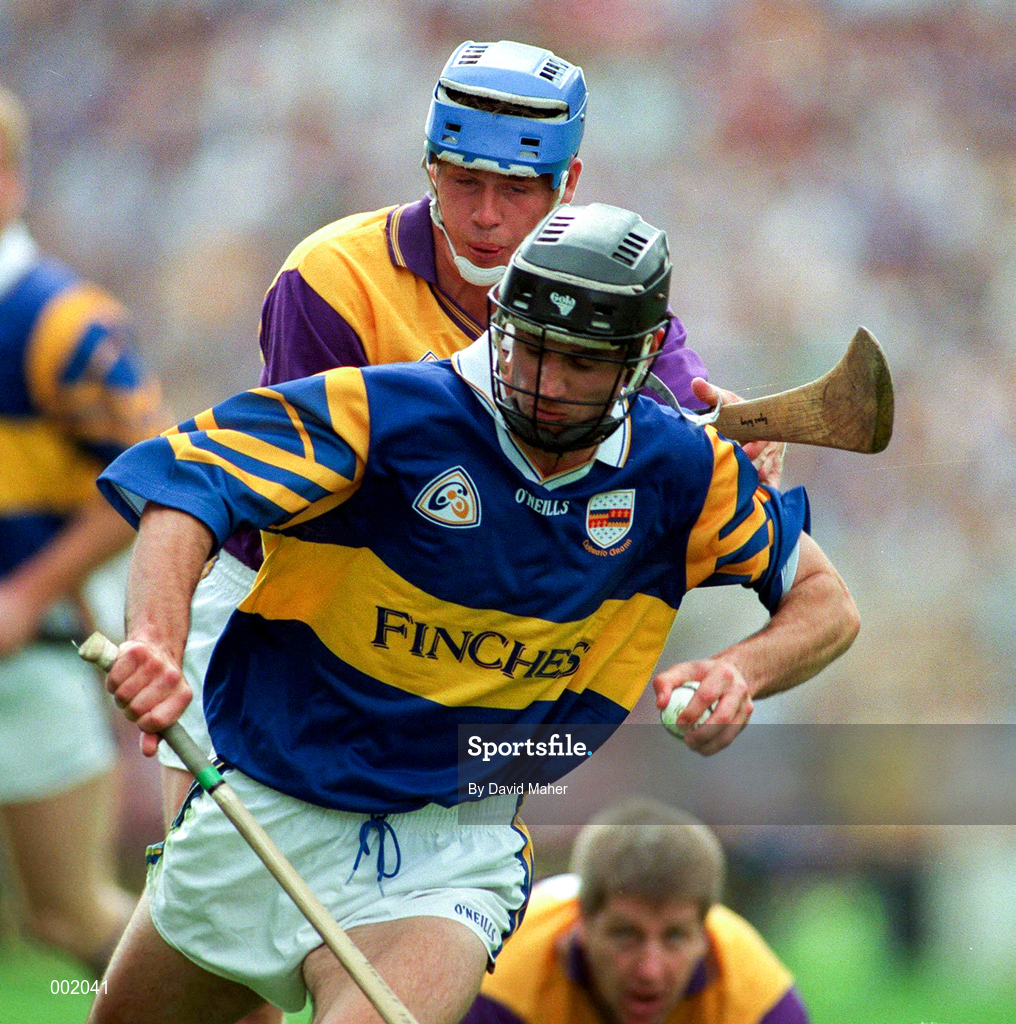 17 August 1997; Thomas Dunne of Tipperary in action against Eugene Furlong of Wexford during the GAA All-Ireland Senior Hurling Championship Semi-Final match between Tipperary and Wexford at Croke Park in Dublin. Photo by David Maher/Sportsfile