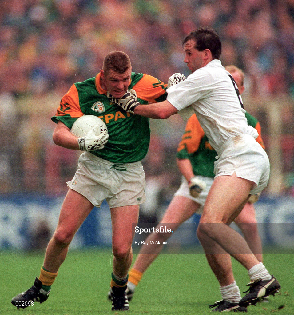 3 August 1997; Tommy Dowd of Meath holds off the challenge by Glenn Ryan of Kildare during the Leinster GAA Senior Football Championship Semi-Final Second Replay match between Kildare and Meath at Croke Park in Dublin. Photo by Ray McManus/Sportsfile