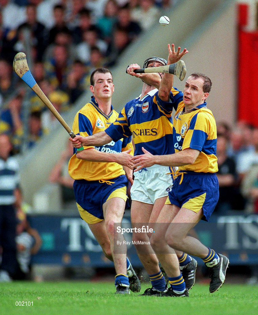 6 July 1997; Tommy Dunne of Tipperay in action against Ollie Baker, left, and Liam Doyle of Clare during the GAA Munster Senior Hurling Championship Final match between Clare and Tipperary at Páirc Uí Chaoimh in Cork. Photo by Ray McManus/Sportsfile
