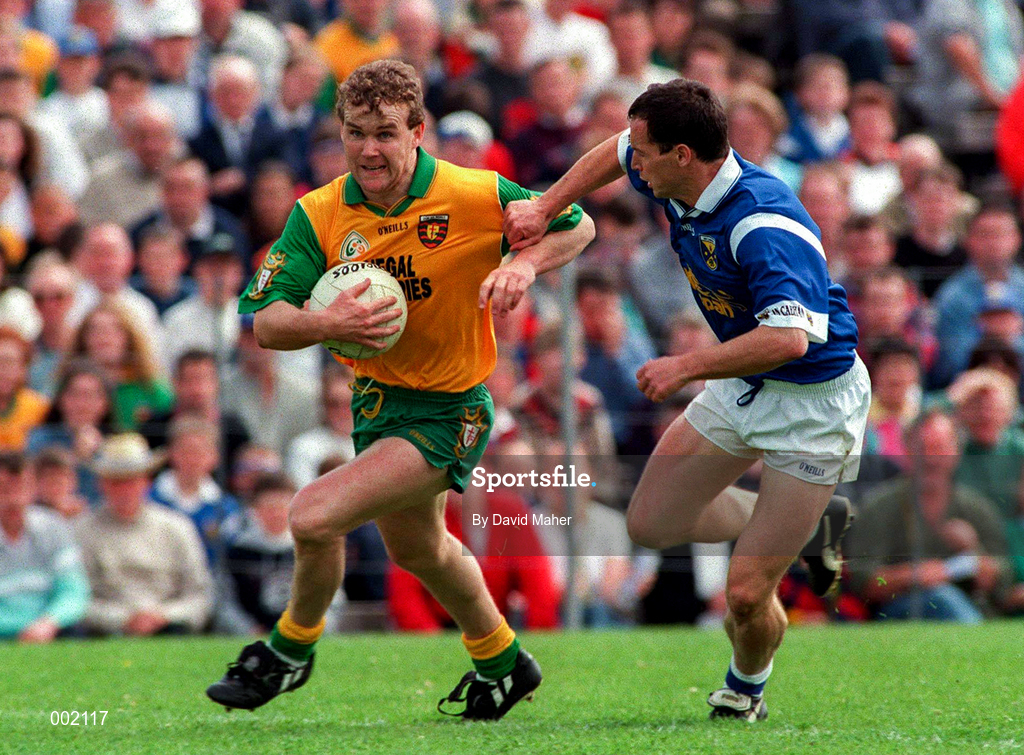 22 June 1997; Tony Boyle of Donegal in action against Damien O'Reilly of Cavan during the Ulster GAA Football Senior Championship Semi-Final match between Cavan and Donegal at St. Tiernach's Park in Clones, Monaghan. Photo by David Maher/Sportsfile