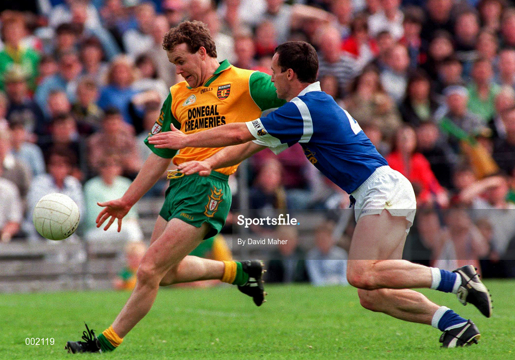 22 June 1997; Tony Boyle of Donegal in action against Damien O'Reilly of Cavan during the Ulster GAA Football Senior Championship Semi-Final match between Cavan and Donegal at St. Tiernach's Park in Clones, Monaghan. Photo by David Maher/Sportsfile
