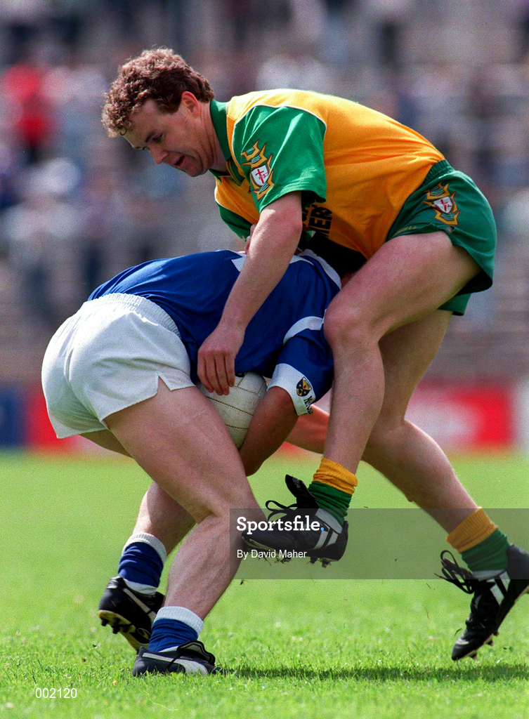22 June 1997; Tony Boyle of Donegal in action against Damien O'Reilly of Cavan during the Ulster GAA Football Senior Championship Semi-Final match between Cavan and Donegal at St. Tiernach's Park in Clones, Monaghan. Photo by David Maher/Sportsfile
