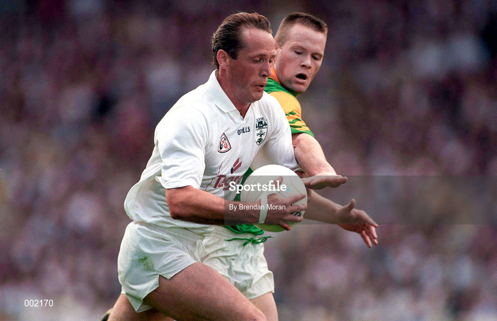 6 July 1997; Willie McCreerey of Kildare is tackled by Jimmy McGuinness of Meath during the Leinster GAA Senior Football Championship Semi-Final match between Kildare and Meath at Croke Park in Dublin. Photo by Brendan Moran/Sportsfile