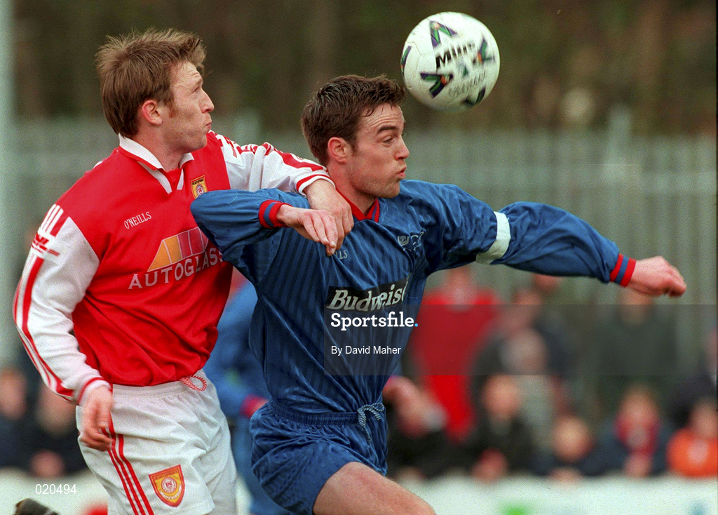 21 March 1999; Aidan Lynch of UCD in action against Trevor Molloy of St Patrick's Athletic during the Harp Lager National League Premier Division match between St Patrick's Athletic and UCD at Richmond Park in Dublin. Photo by David Maher/Sportsfile