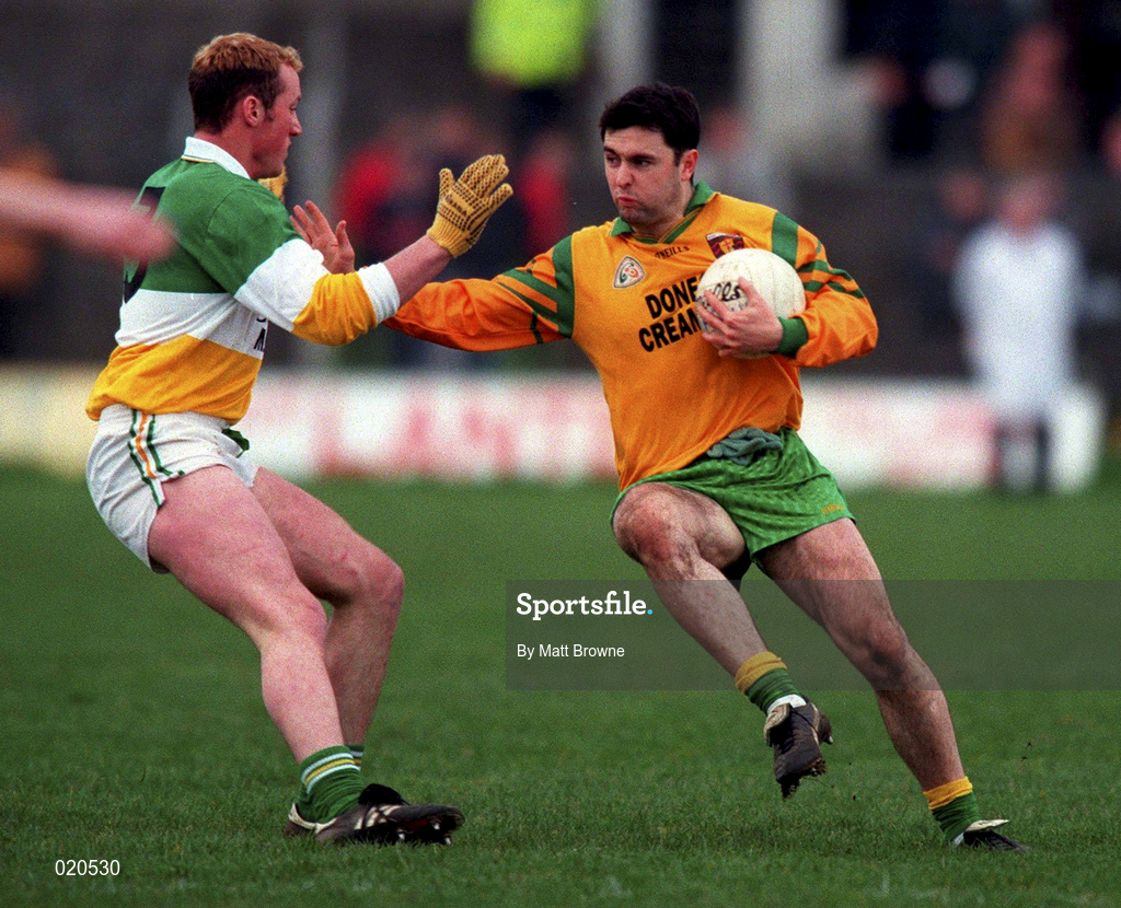 14 March 1999; Barry Ward of Donegal in action against John Ryan of Offaly during the Church and General National Football League Division 1 match between Offaly and Donegal at O'Connor Park in Tullamore, Offaly. Photo by Matt Browne/Sportsfile