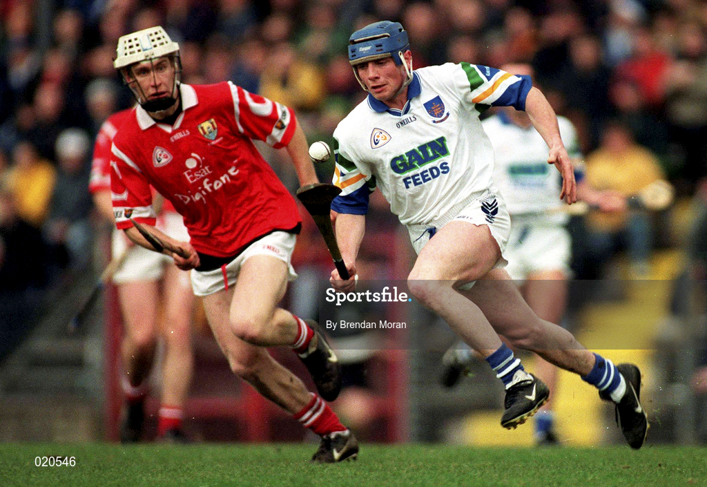 27 March 1999; Brian Greene of Waterford in action against Timmy McCarthy of Cork during the Church and General National Hurling League Division 1B match between Cork and Waterford at Páirc Uí Rinn in Cork. Photo by Brendan Moran/Sportsfile