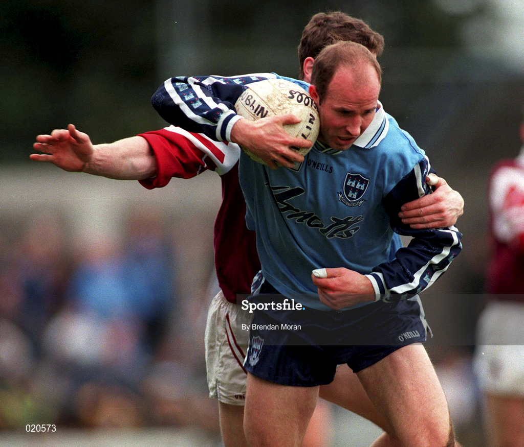 14 March 1999; Brian Stynes of Dublin is tackled by Jarlath Fallon of Galway during the Church and General National Football League Division 1 match between Dublin and Galway at Parnell Park in Dublin. Photo by Brendan Moran/Sportsfile