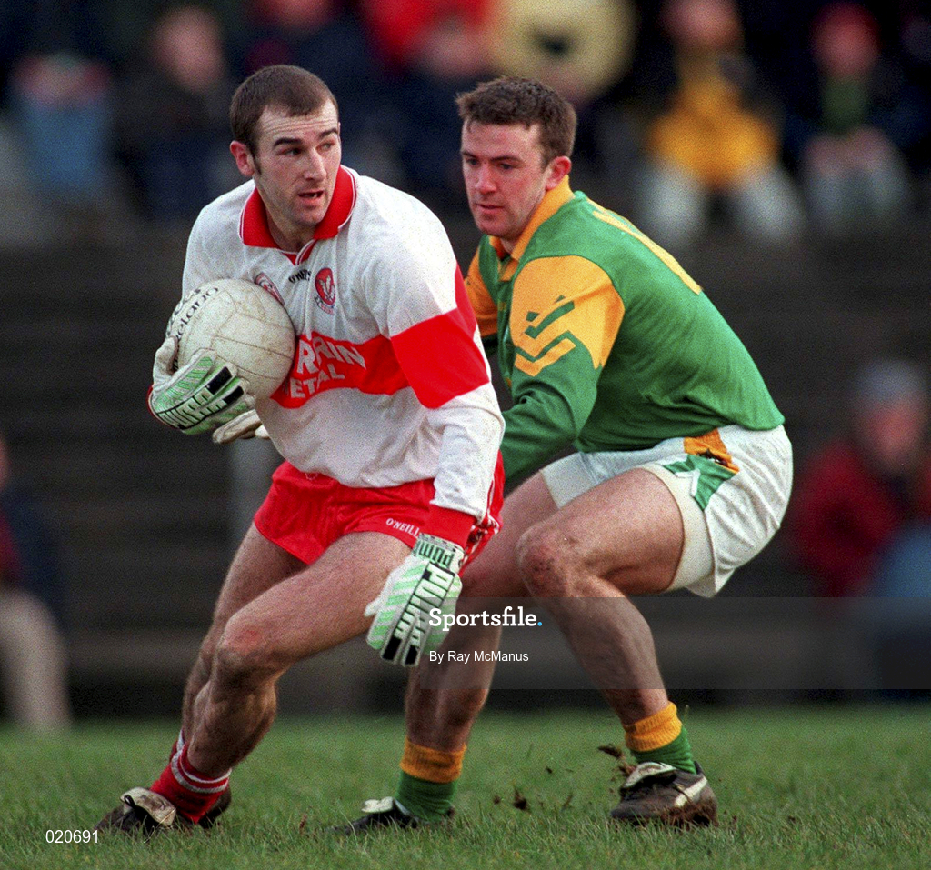 28 February 1999; David O'Neill of Derry in action against Evan Kelly of Meath during the Church and General National Football League Division 1 match between Meath and Derry at Páirc Tailteann in Navan, Meath. Photo by Ray McManus/Sportsfile