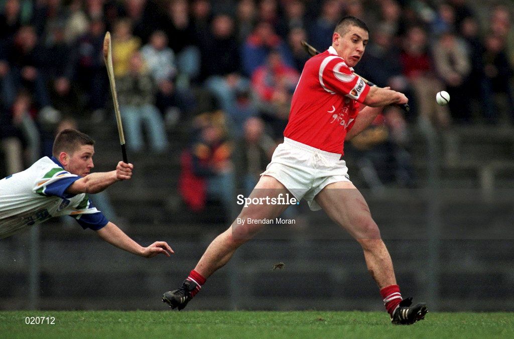 27 March 1999; Derek Barrett of Cork in action against Ken McGrath of Waterford during the Church and General National Hurling League Division 1B match between Cork and Waterford at Páirc Uí Rinn in Cork. Photo by Brendan Moran/Sportsfile