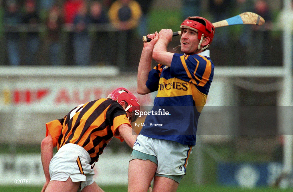 28 March 1999; Eddie Tucker of Tipperary in action against Johnny Butler of Kilkenny during the Church and General National Hurling League Division 1B match between Kilkenny and Tipperary at Nowlan Park in Kilkenny. Photo by Matt Browne/Sportsfile