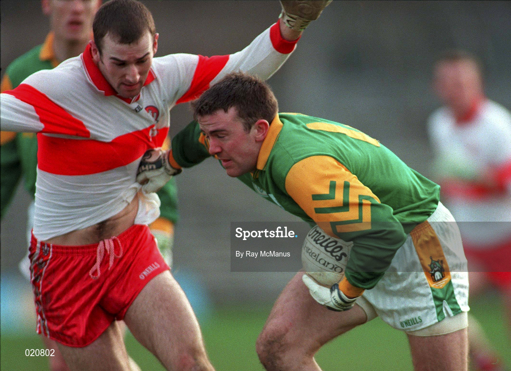 28 February 1999; Evan Kelly of Meath in action against David O'Neill of Derry during the Church and General National Football League Division 1 match between Meath and Derry at Páirc Tailteann in Navan, Meath. Photo by Ray McManus/Sportsfile