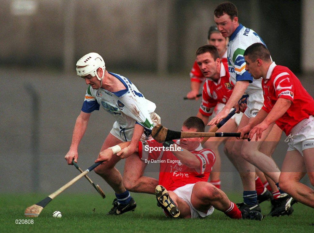 27 March 1999; Fergal Hartley of Waterford is tackled by Diarmuid O'Sullivan of Cork during the Church and General National Hurling League Division 1B match between Cork and Waterford at Páirc Uí Rinn in Cork. Photo by Damien Eagers/Sportsfile