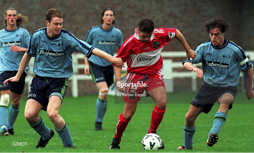 27 September 1998; Gerard Dobbs of Cork City in action against Tony McDonnell, left, and Aidan Lynch of UCD during the Harp Lager National League Premier Division match between UCD and Cork City at Belfield Park in Dublin. Photo by Damien Eagers/Sportsfile