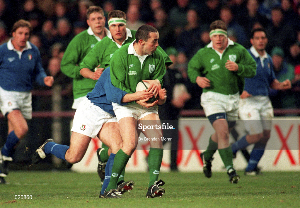 4 January 1997; Conor O'Shea of Ireland is tackled by Marcello Cuttitta of Italy during the International Rugby match between Ireland and Italy at Lansdowne Road in Dublin. Photo by Brendan Moran/Sportsfile
