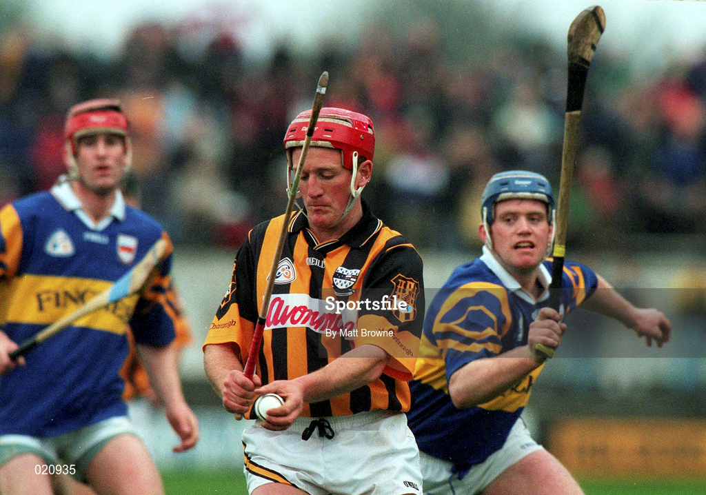 28 March 1999; Johnny Butler of Kilkenny in against Eugene O'Neill of Tipperary during the Church and General National Hurling League Division 1B match between Kilkenny and Tipperary at Nowlan Park in Kilkenny. Photo by Matt Browne/Sportsfile