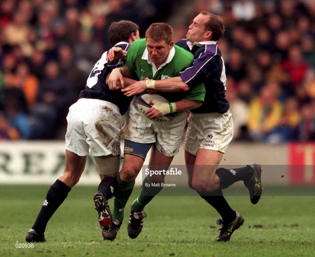 20 March 1999; Jonathan Bell of Ireland is tackled by John Leslie, left, and Gregor Townsend of Scotland during the Five Nations Rugby Championship match between Scotland and Ireland in Murrayfield Stadium in Edinburgh, Scotland. Photo by Matt Browne/Sportsfile