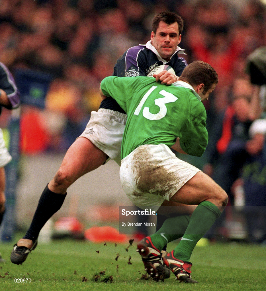 20 March 1999; Kenny Logan of Scotland is tackled by Kevin Maggs of Ireland during the Five Nations Rugby Championship match between Scotland and Ireland in Murrayfield Stadium in Edinburgh, Scotland. Photo by Matt Browne/Sportsfile