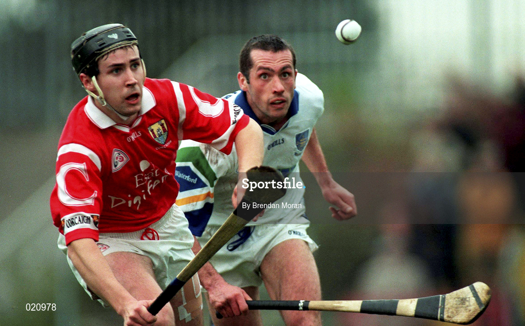 27 March 1999; Kieran Morrisson of Cork in action against Peter Queally of Waterford during the Church and General National Hurling League Division 1B match between Cork and Waterford at Páirc Uí Rinn in Cork. Photo by Brendan Moran/Sportsfile