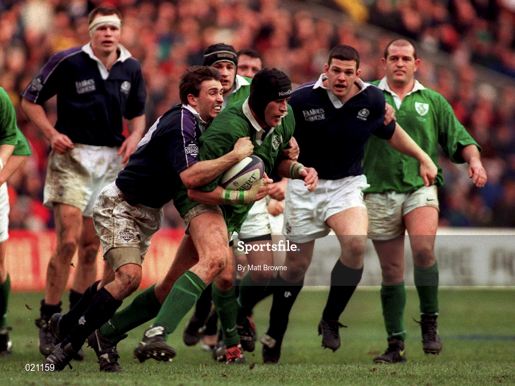 20 March 1999; Paddy Johns of Ireland is tackled by John Leslie of Scotland during the Five Nations Rugby Championship match between Scotland and Ireland in Murrayfield Stadium in Edinburgh, Scotland. Photo by Matt Browne/Sportsfile