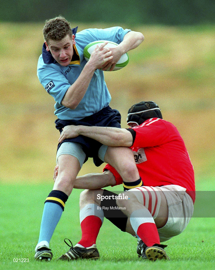 3 April 1999; Philip Bredin of UCD is tackled by Ian Dillon of Bohemians during the AIB All-Ireland League Division 3 match between UCD RFC and Bohemians RFC at the Belfield Bowl in Dublin. Photo by Ray McManus/Sportsfile