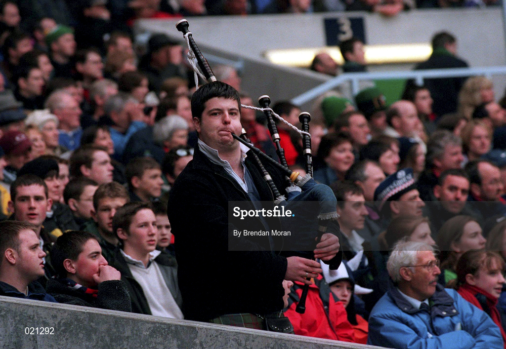 20 March 1999; A Scotland rugby fan plays the bagpipes during the Five Nations Rugby Championship match between Scotland and Ireland in Murrayfield Stadium in Edinburgh, Scotland. Photo by Brendan Moran/Sportsfile